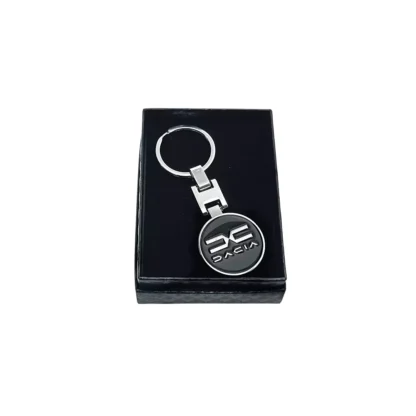 Breloc Dacia, sigla pe ambele parti, din metal, ambalat in cutie, Magrot 20383 Dacia